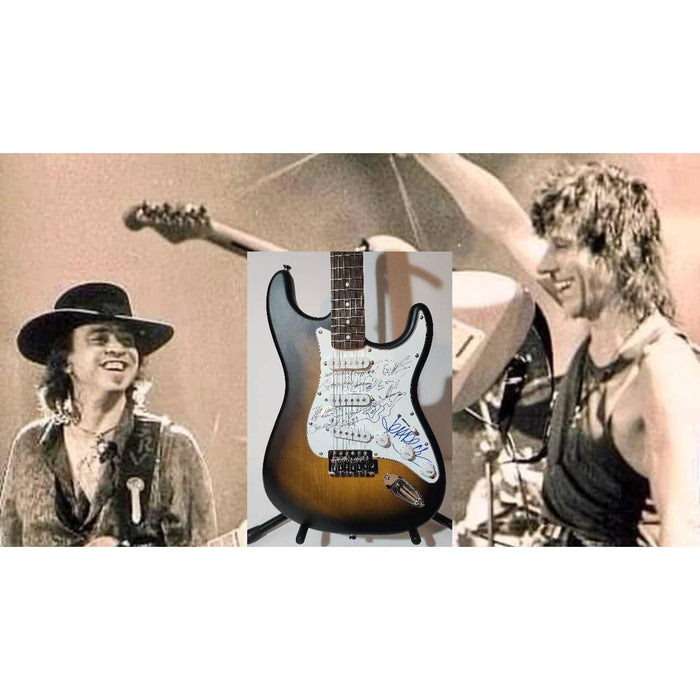 Stevie Ray Vaughan and Jeff Beck Fender Stratocaster electric guitar signed with proof