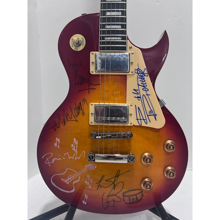 Bill Wyman, Keith Richards, Mick Jagger, Charlie Watts, Ronnie Wood Rolling Stones vintage cherry les paul full size electric guitar.