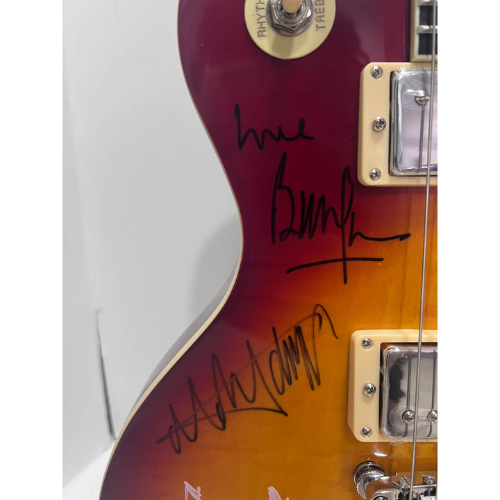 Bill Wyman, Keith Richards, Mick Jagger, Charlie Watts, Ronnie Wood Rolling Stones vintage cherry les paul full size electric guitar.