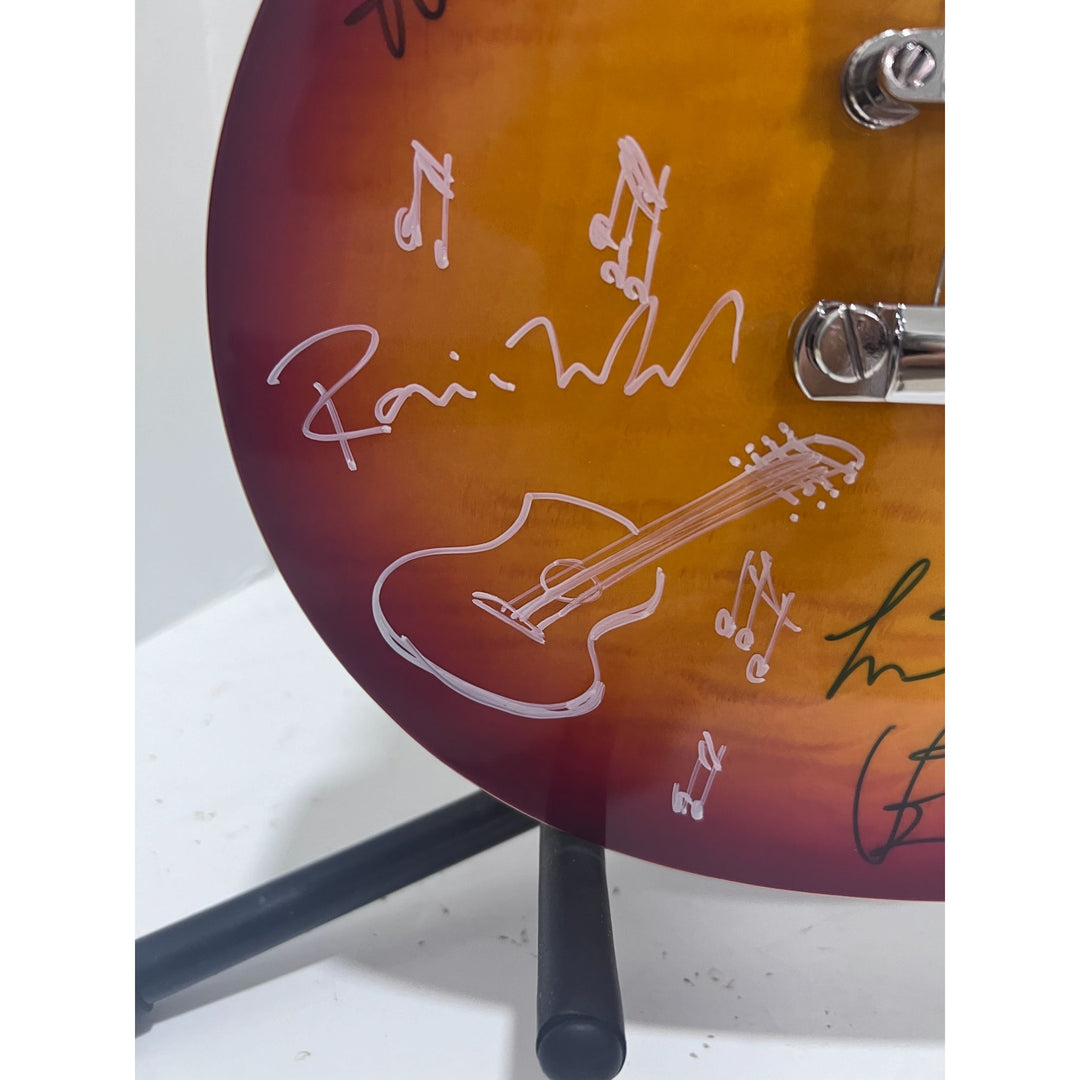 Bill Wyman, Keith Richards, Mick Jagger, Charlie Watts, Ronnie Wood Rolling Stones vintage cherry les paul full size electric guitar.