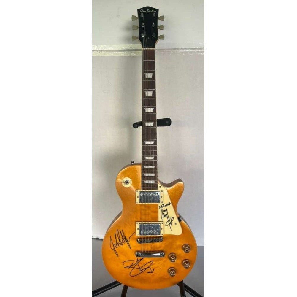 Led Zeppelin Jimmy Page, Robert Plant, John Paul Jones gold les paul electric guitar signed with proof.