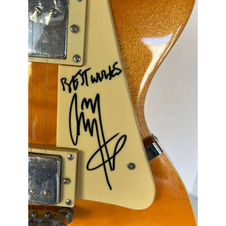 Led Zeppelin Jimmy Page, Robert Plant, John Paul Jones gold les paul electric guitar signed with proof.