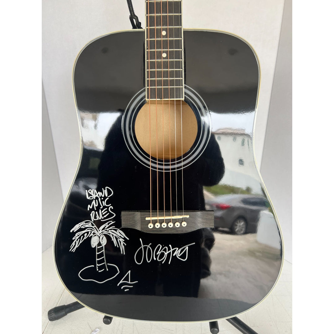 Jimmy Buffett full size acoustic guitar signed with sketch & proof