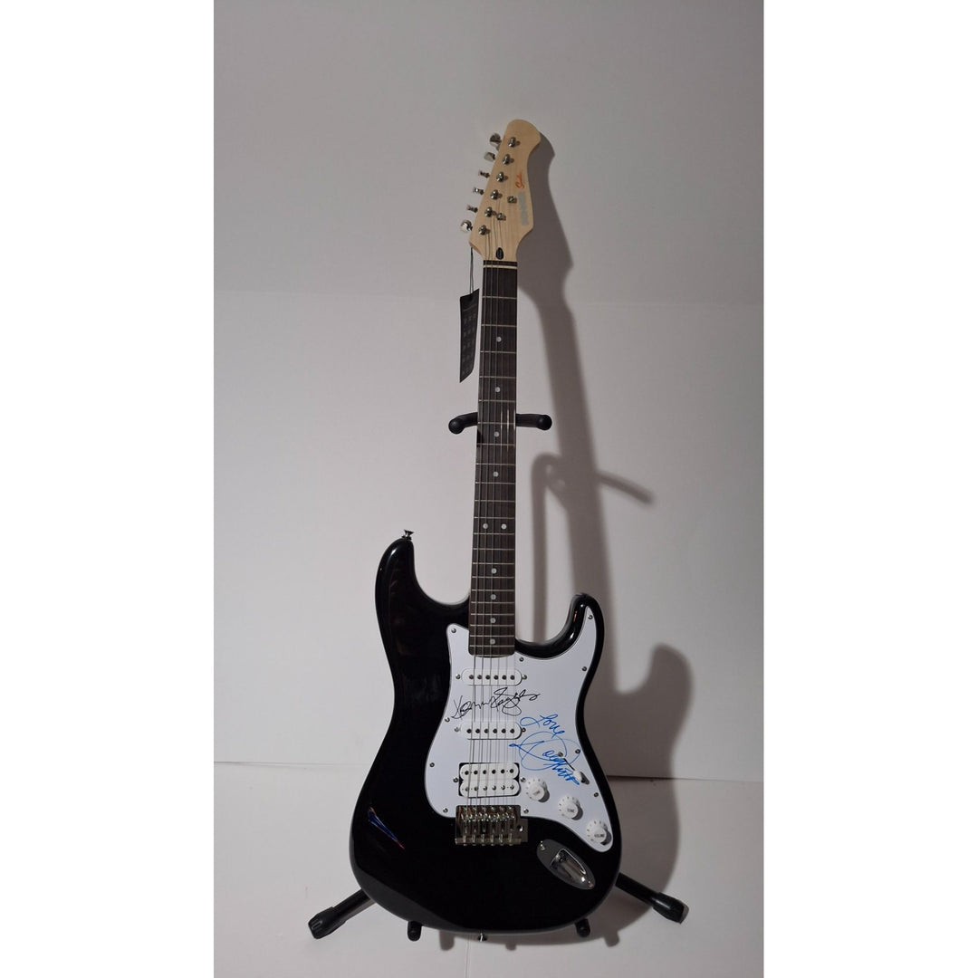 Kenny Rogers and Dolly Parton Fender Stratocaster electric guitar signed with proof