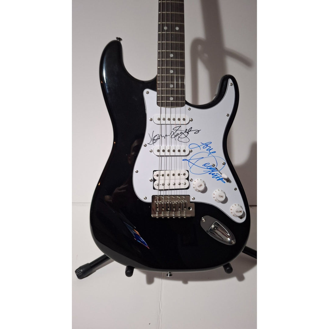 Kenny Rogers and Dolly Parton Fender Stratocaster electric guitar signed with proof