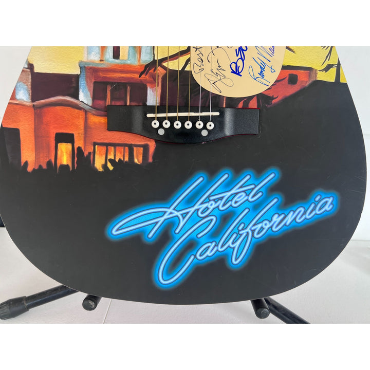 Eagles Glen Frey, Don Henley, Randy Meisner, Bernie Leadon full size acoustic guitar (one of a kind ) signed with proof.