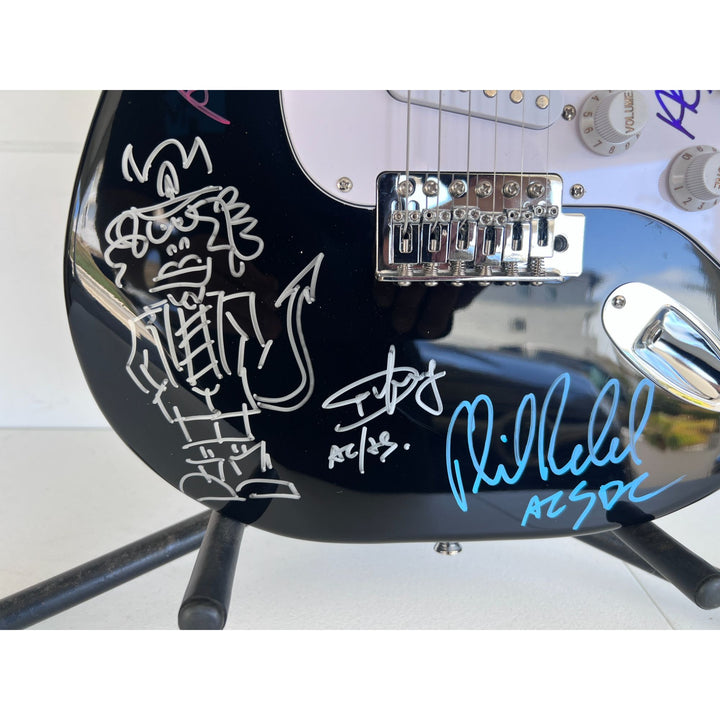 Angus Young & Malcolm Young Brian Johnston Cliff Williams Phil Rudd electric guitar signed with proof.