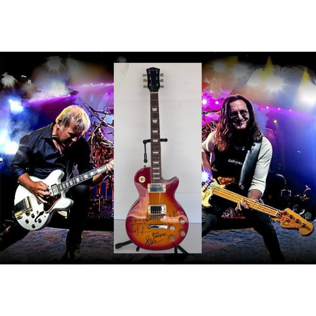 Rush one of a kind Geddy Lee Neil Peart Alex Lifeson vintage cherry les pail full size electric guitar signed and inscribed with proof.