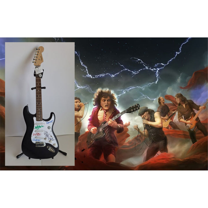 Angus & Malcolm Young, Brian Johnston, Phil Rudd, Cliff Williams AC/DC Fender Stratocaster electric guitar signed with proof