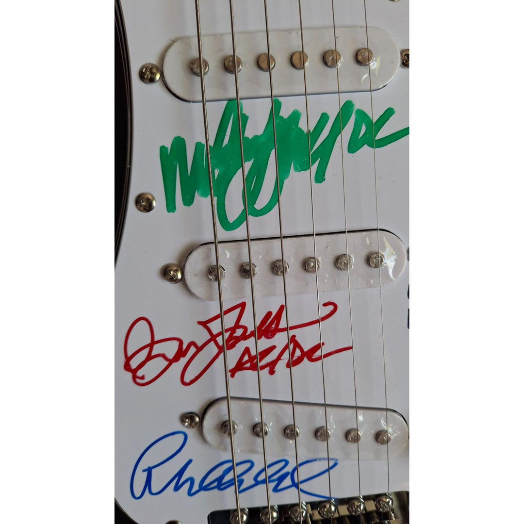 Angus & Malcolm Young, Brian Johnston, Phil Rudd, Cliff Williams AC/DC Fender Stratocaster electric guitar signed with proof
