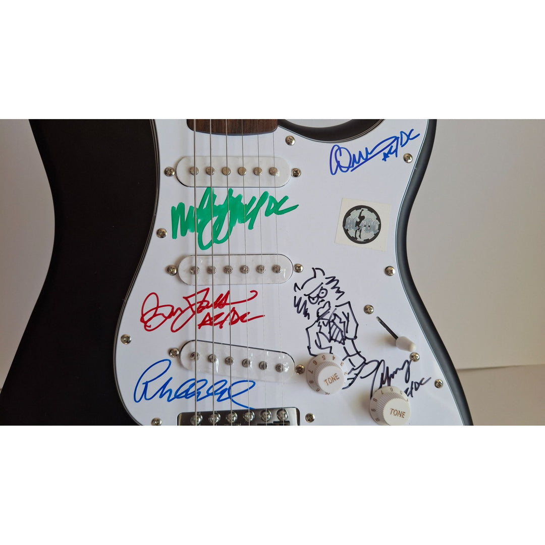 Angus & Malcolm Young, Brian Johnston, Phil Rudd, Cliff Williams AC/DC Fender Stratocaster electric guitar signed with proof