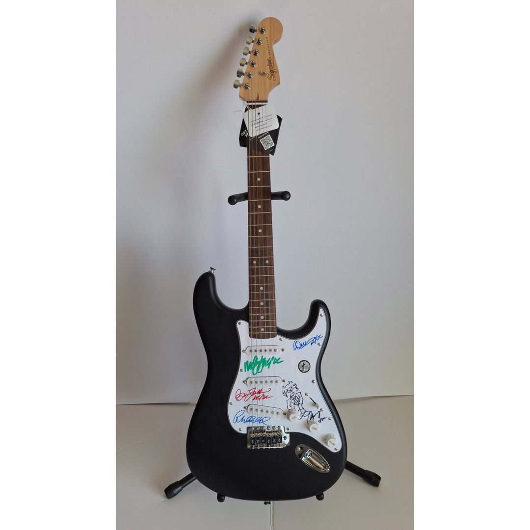 Angus & Malcolm Young, Brian Johnston, Phil Rudd, Cliff Williams AC/DC Fender Stratocaster electric guitar signed with proof