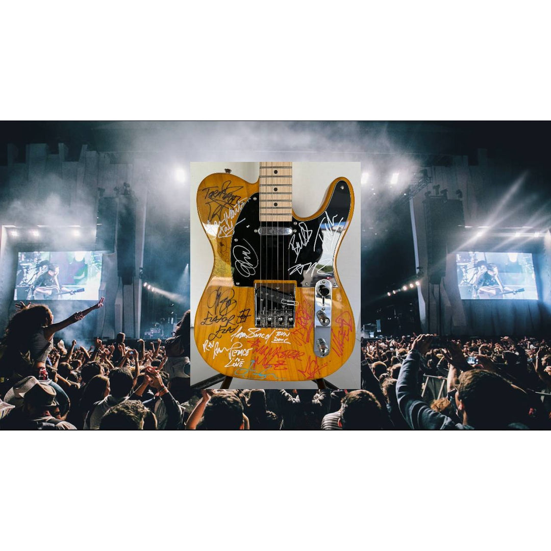 Beastie Boys,  Run DMC, RATM, Public Enemy  wood telecaster  electric guitar signed with proof.