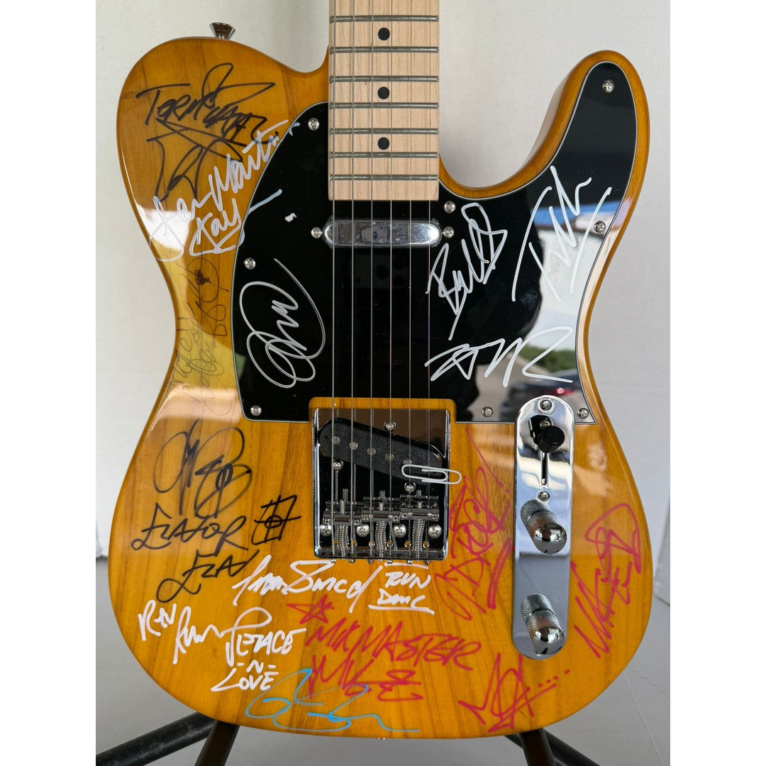 Beastie Boys,  Run DMC, RATM, Public Enemy  wood telecaster  electric guitar signed with proof.