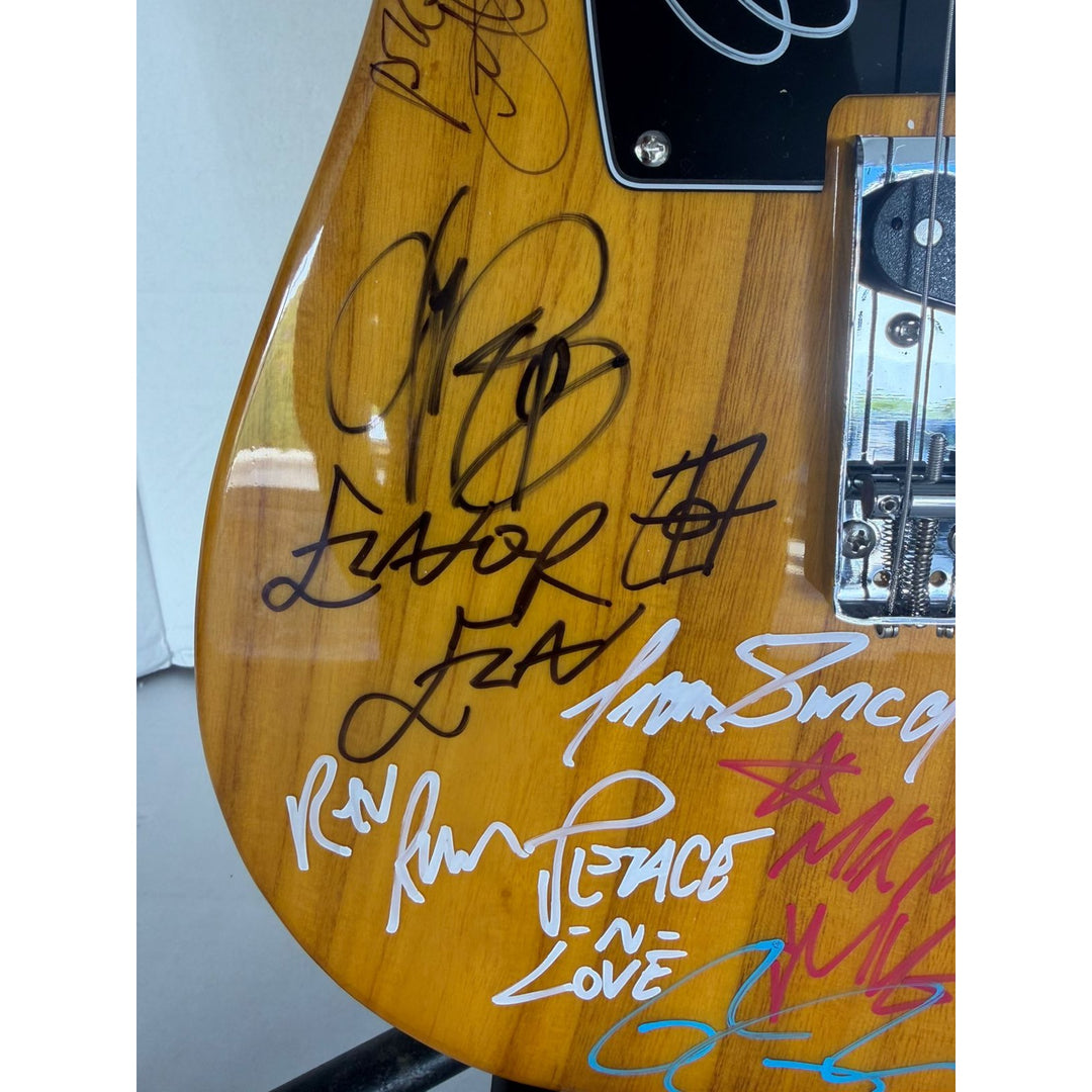 Beastie Boys,  Run DMC, RATM, Public Enemy  wood telecaster  electric guitar signed with proof.