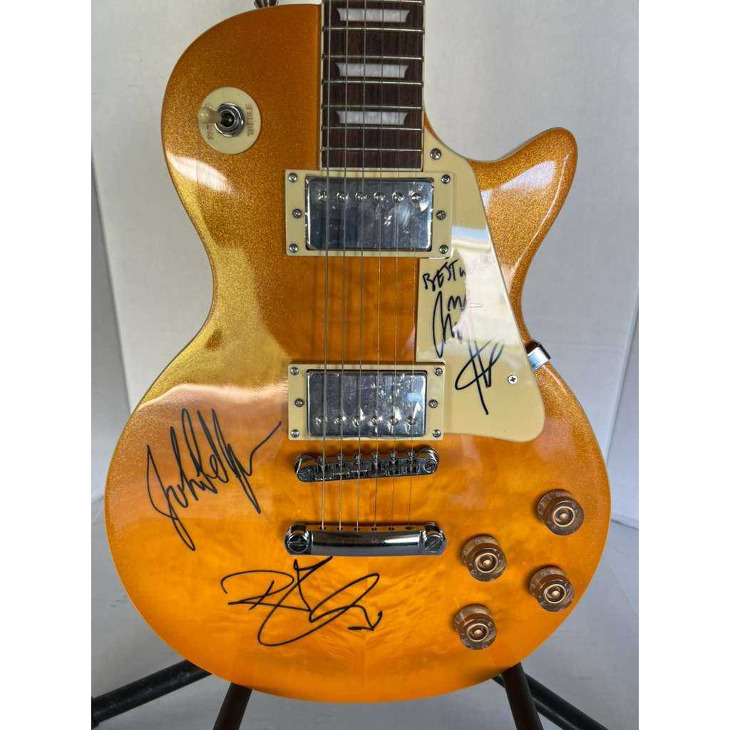 Led Zeppelin Jimmy Page, Robert Plant, John Paul Jones gold les paul electric guitar signed with proof.
