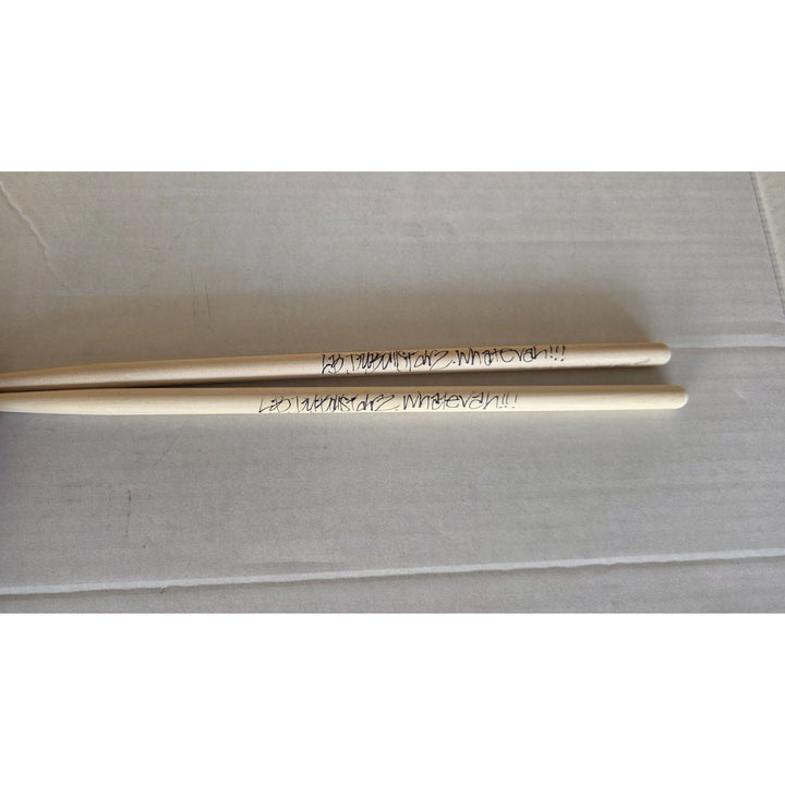 Long Beach dub all star Bud Gaugh pair of drumsticks signed with proof.