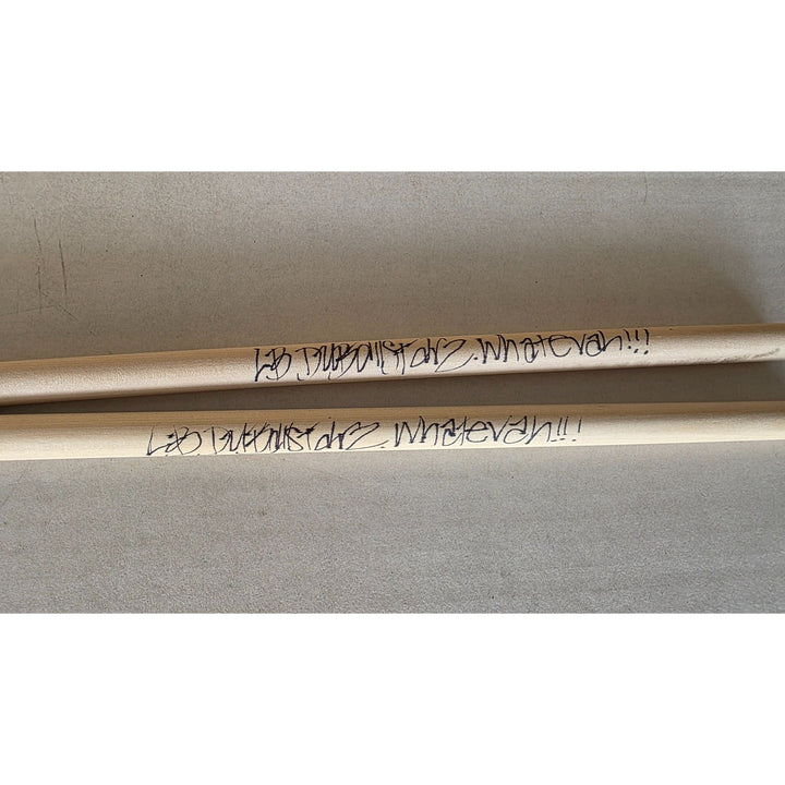 Long Beach dub all star Bud Gaugh pair of drumsticks signed with proof.