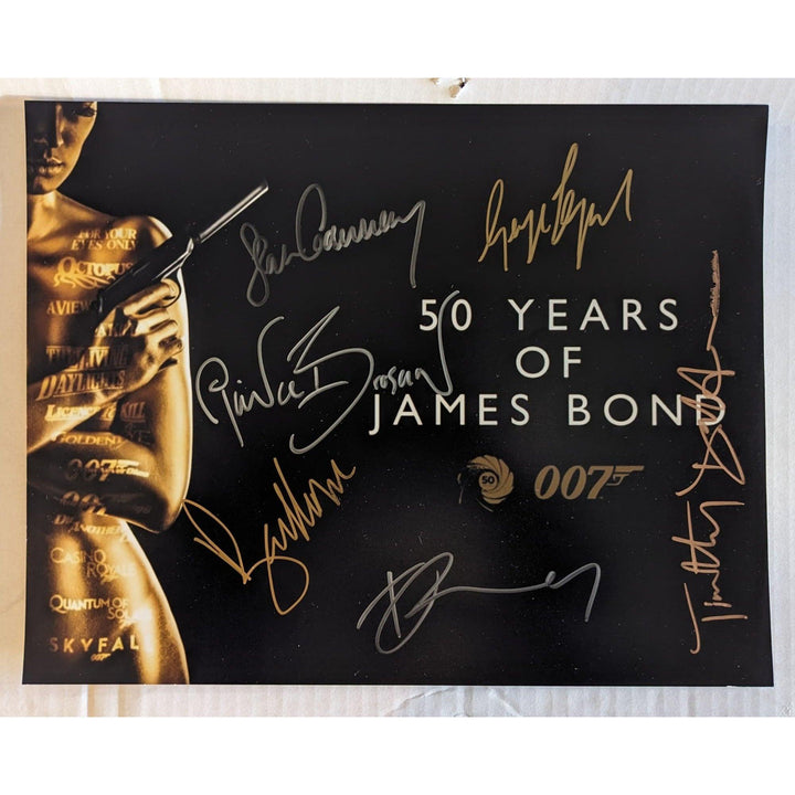 James Bond 007, Sean Connery, Roger Moore, Daniel Craig, Pierce Brosnan, Timothy Dalton, George Lazenby 11x14 photo signed with proof