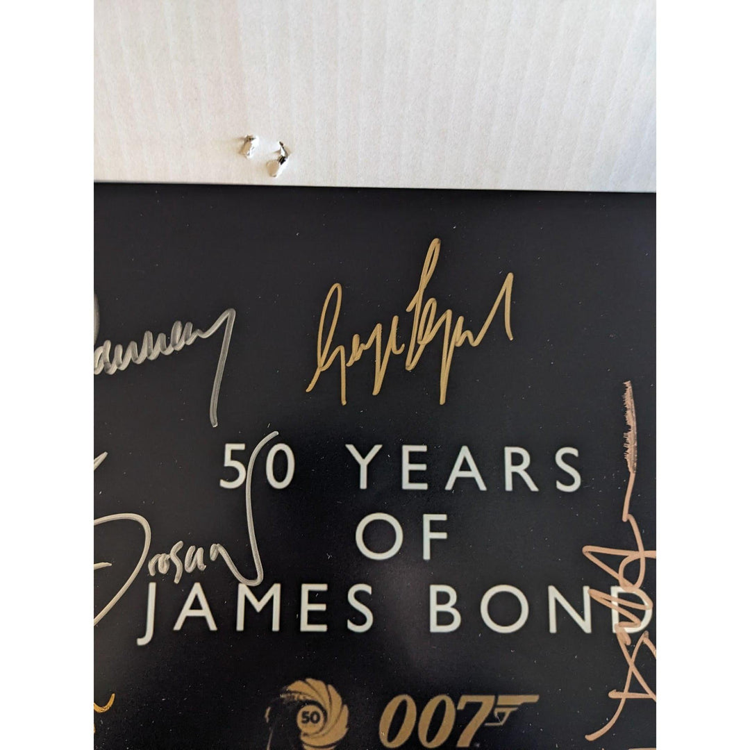 James Bond 007, Sean Connery, Roger Moore, Daniel Craig, Pierce Brosnan, Timothy Dalton, George Lazenby 11x14 photo signed with proof