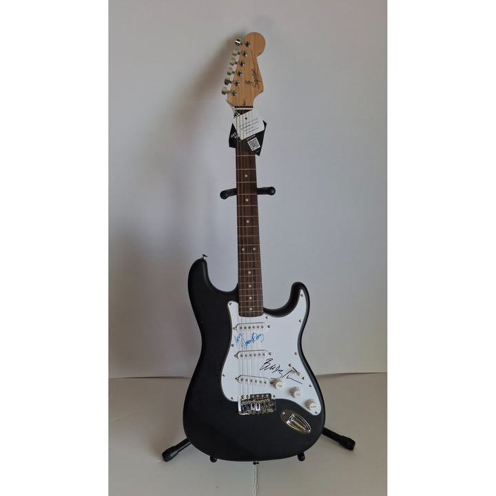 Joan Baez & Bob Dylan, authentic Fender Stratocaster electric guitar signed with proof