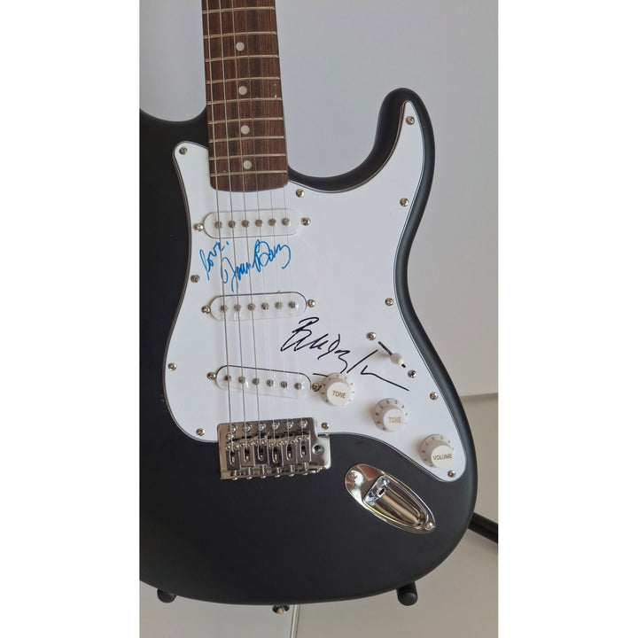 Joan Baez & Bob Dylan, authentic Fender Stratocaster electric guitar signed with proof