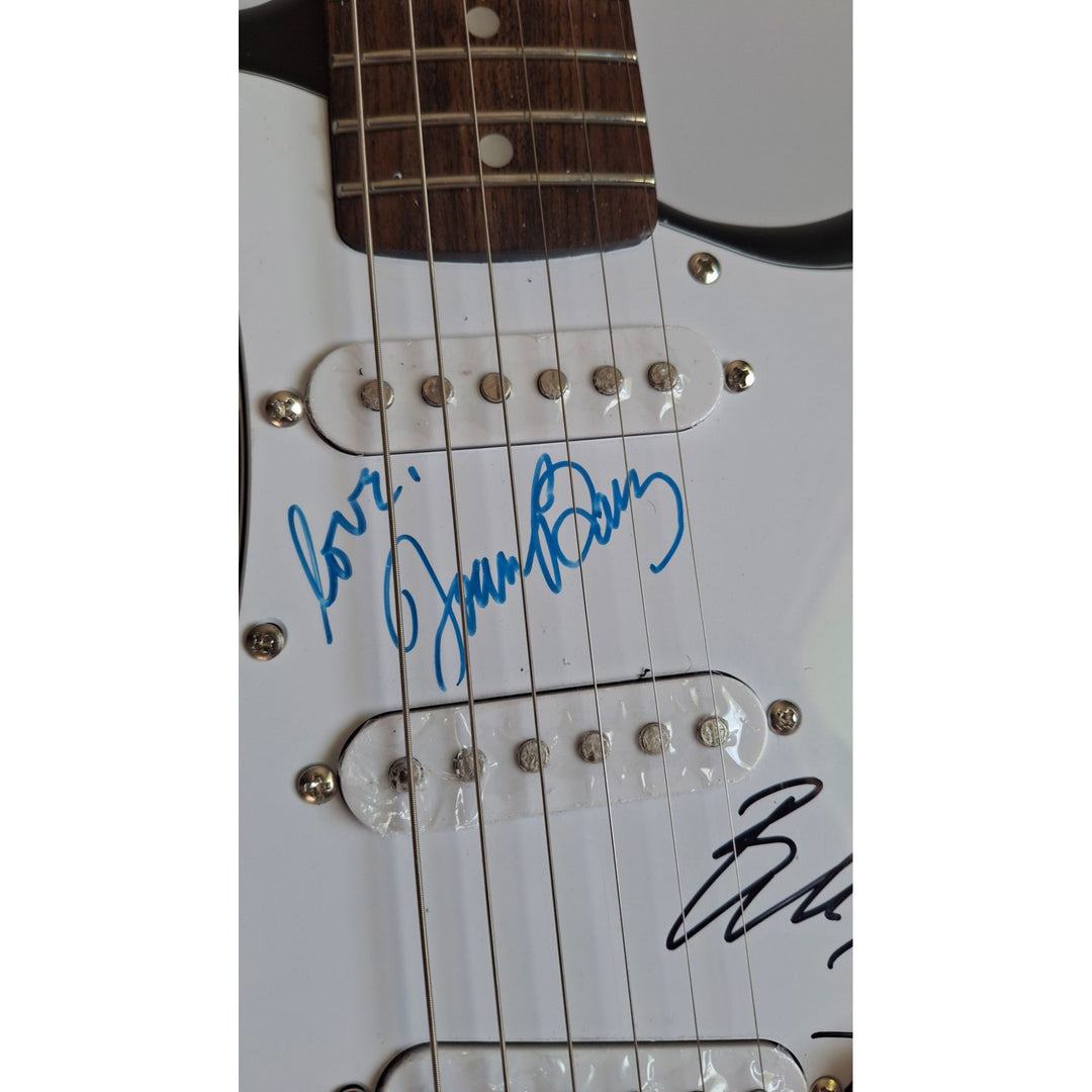 Joan Baez & Bob Dylan, authentic Fender Stratocaster electric guitar signed with proof