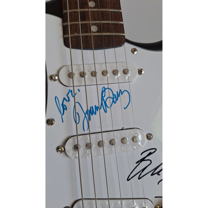 Joan Baez & Bob Dylan, authentic Fender Stratocaster electric guitar signed with proof