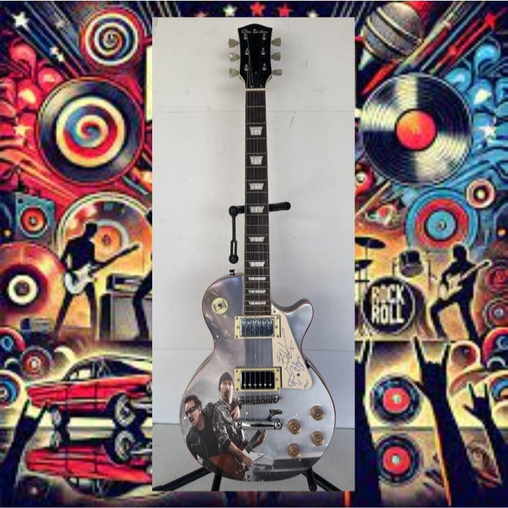 U2 Paul Hewson " Bono" and "the Edge" David Howell Evans   one of a kind les paul (full size) electric guitar signed with proof.
