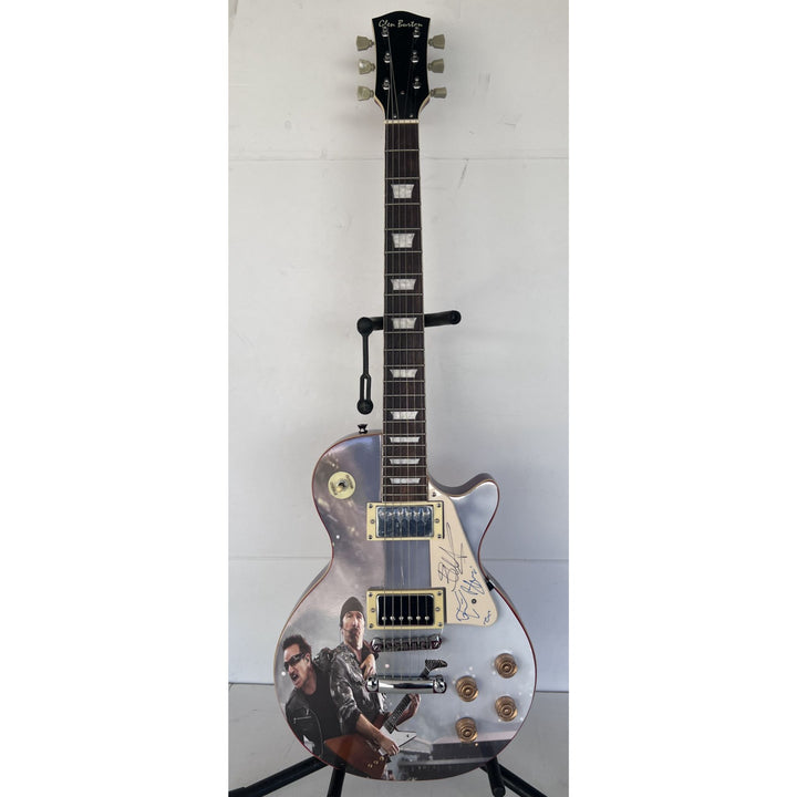 U2 Paul Hewson " Bono" and "the Edge" David Howell Evans   one of a kind les paul (full size) electric guitar signed with proof.