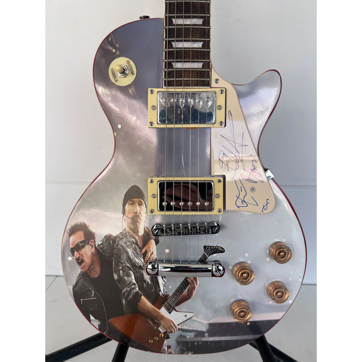 U2 Paul Hewson " Bono" and "the Edge" David Howell Evans   one of a kind les paul (full size) electric guitar signed with proof.