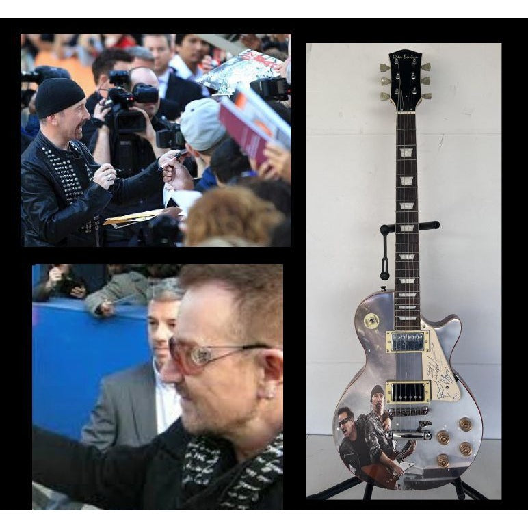 U2 Paul Hewson " Bono" and "the Edge" David Howell Evans   one of a kind les paul (full size) electric guitar signed with proof.