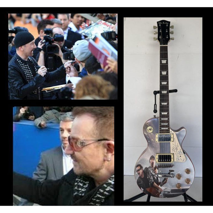 U2 Paul Hewson " Bono" and "the Edge" David Howell Evans   one of a kind les paul (full size) electric guitar signed with proof.