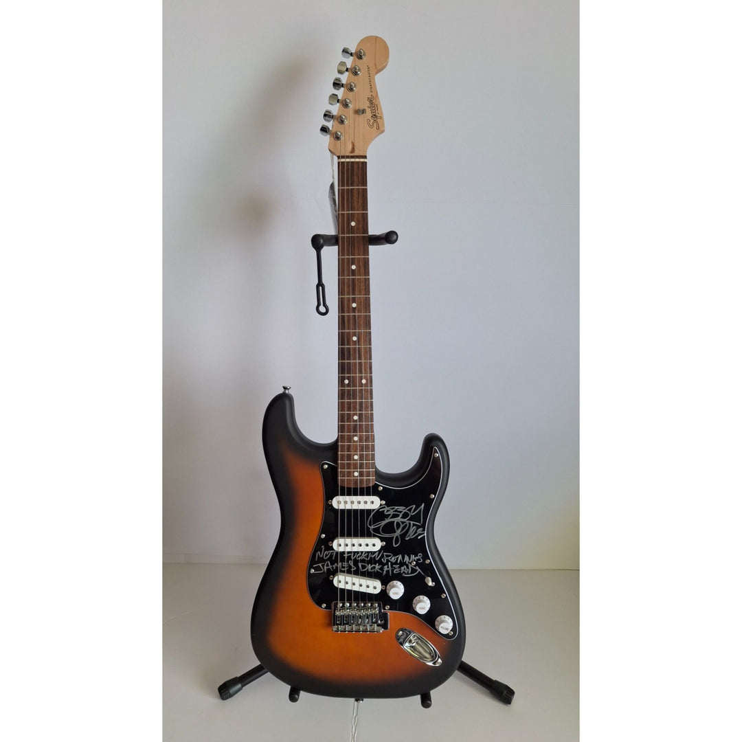 Black Sabbath, Ozzy Osbourne, signed with inscription for Ronnie James Dio, Fender Stratocaster electric guitar signed with proof