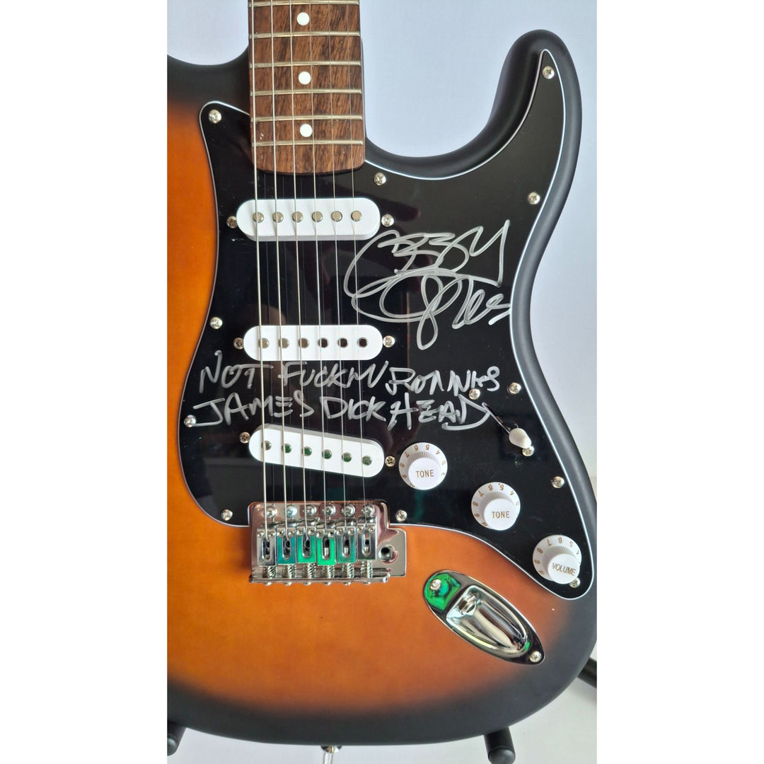 Black Sabbath, Ozzy Osbourne, signed with inscription for Ronnie James Dio, Fender Stratocaster electric guitar signed with proof