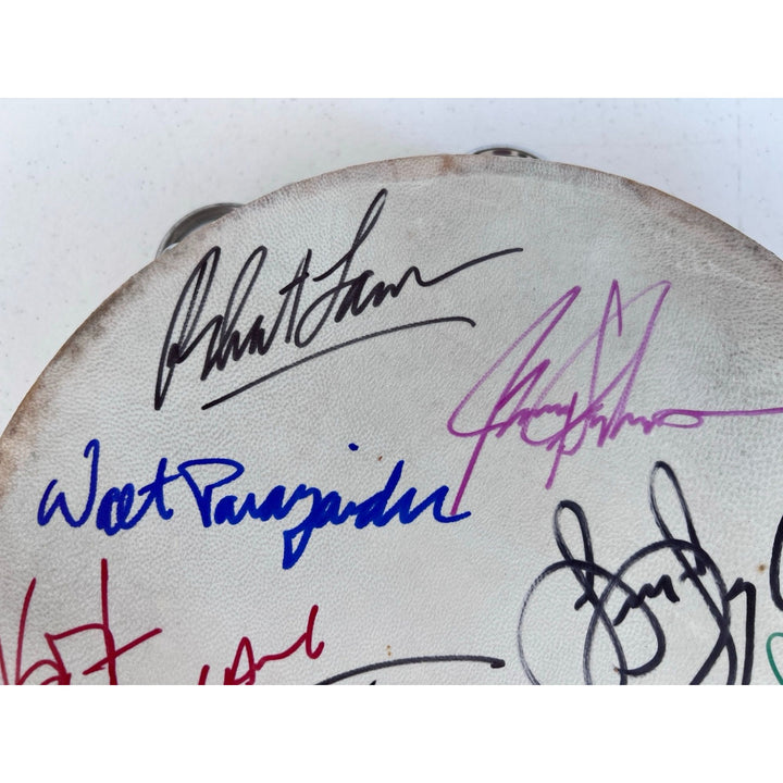 Chicago band tambourine Peter Cetara, Robert Lamm, Lee Loughnane, Danny Seraphine, Terry Kath, Walt Parazaider and Jimmy Pankow signed.