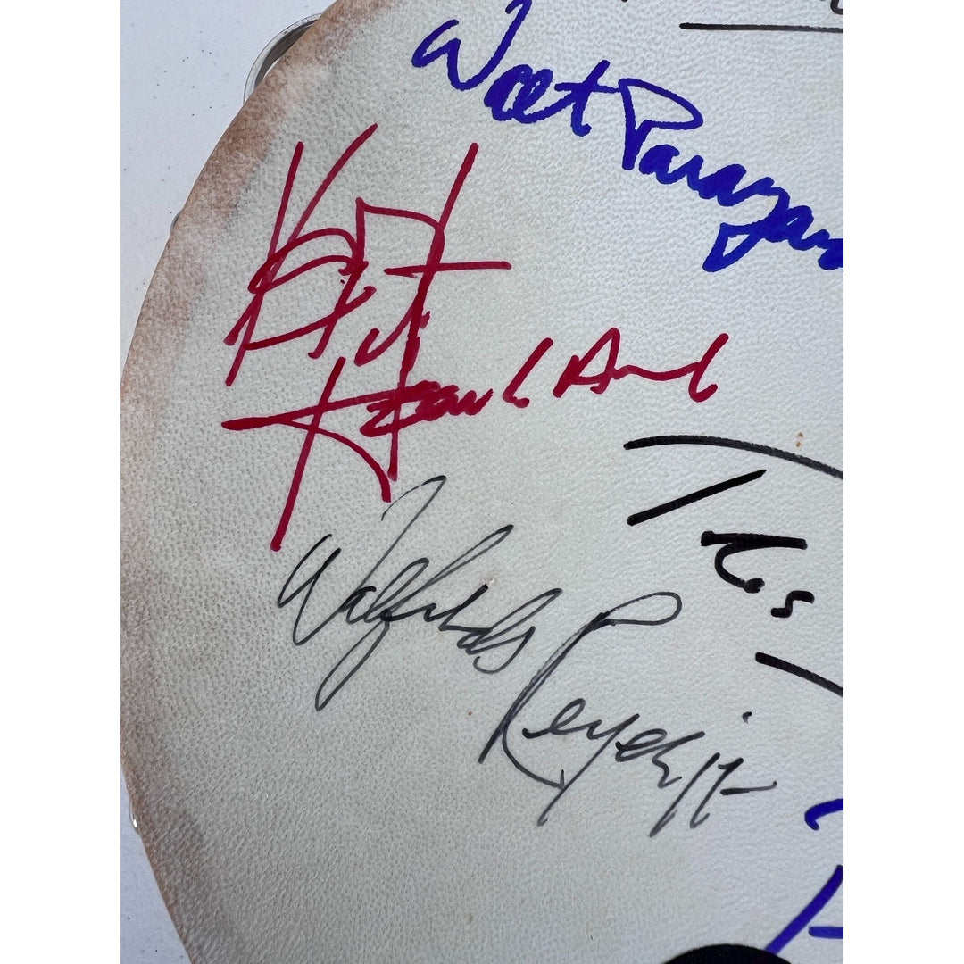 Chicago band tambourine Peter Cetara, Robert Lamm, Lee Loughnane, Danny Seraphine, Terry Kath, Walt Parazaider and Jimmy Pankow signed.