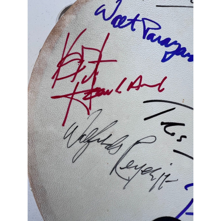 Chicago band tambourine Peter Cetara, Robert Lamm, Lee Loughnane, Danny Seraphine, Terry Kath, Walt Parazaider and Jimmy Pankow signed.