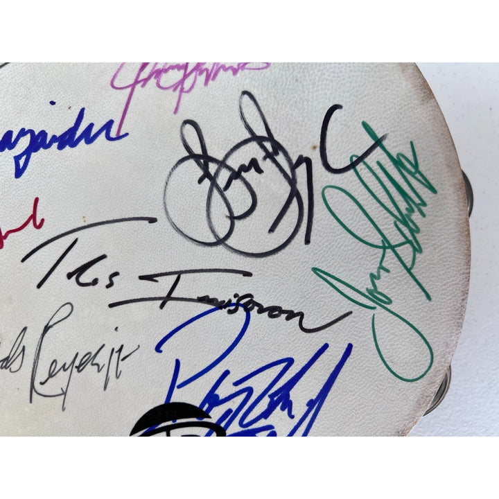 Chicago band tambourine Peter Cetara, Robert Lamm, Lee Loughnane, Danny Seraphine, Terry Kath, Walt Parazaider and Jimmy Pankow signed.