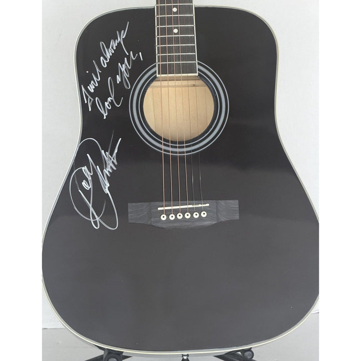 Dolly Parton full size black acoustic guitar signed with proof.