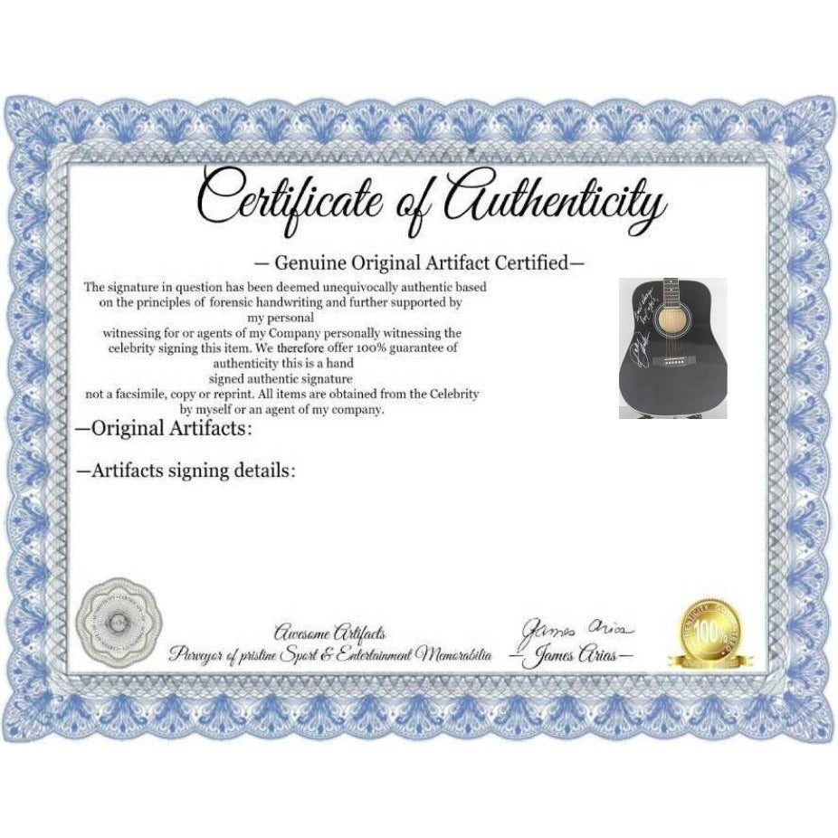 Dolly Parton full size black acoustic guitar signed with proof.