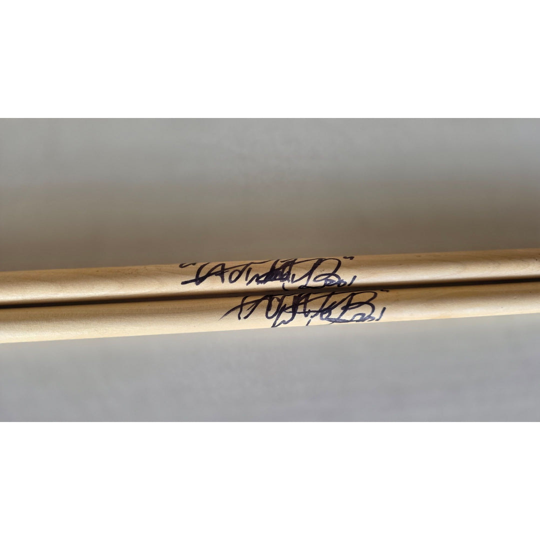 Charlie Watts of Rolling Stones Drumsticks signed with proof.
