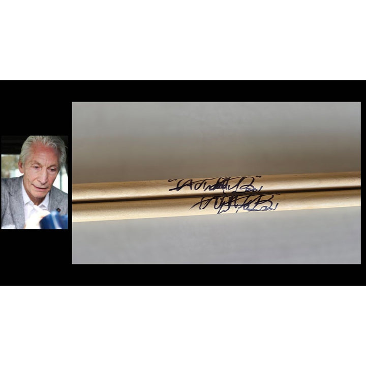 Charlie Watts of Rolling Stones Drumsticks signed with proof.