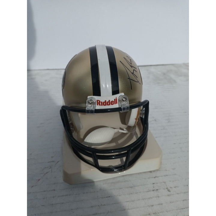 New Orleans Saints Drew Brees and Reggie Bush Riddell mini helmet signed with proof