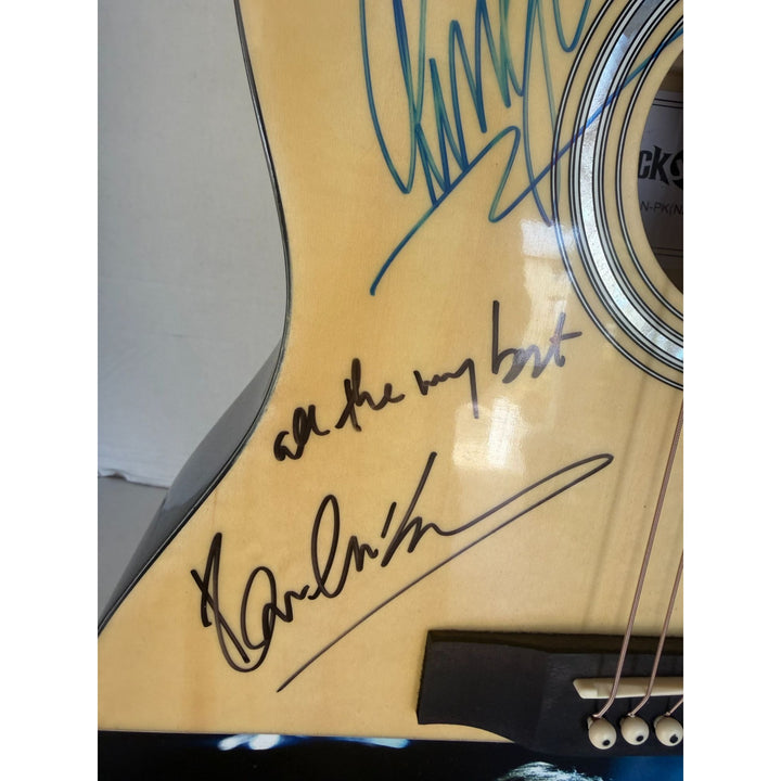 Ringo Starr & Paul McCartney of the Beatles acoustic guitar signed with proof.
