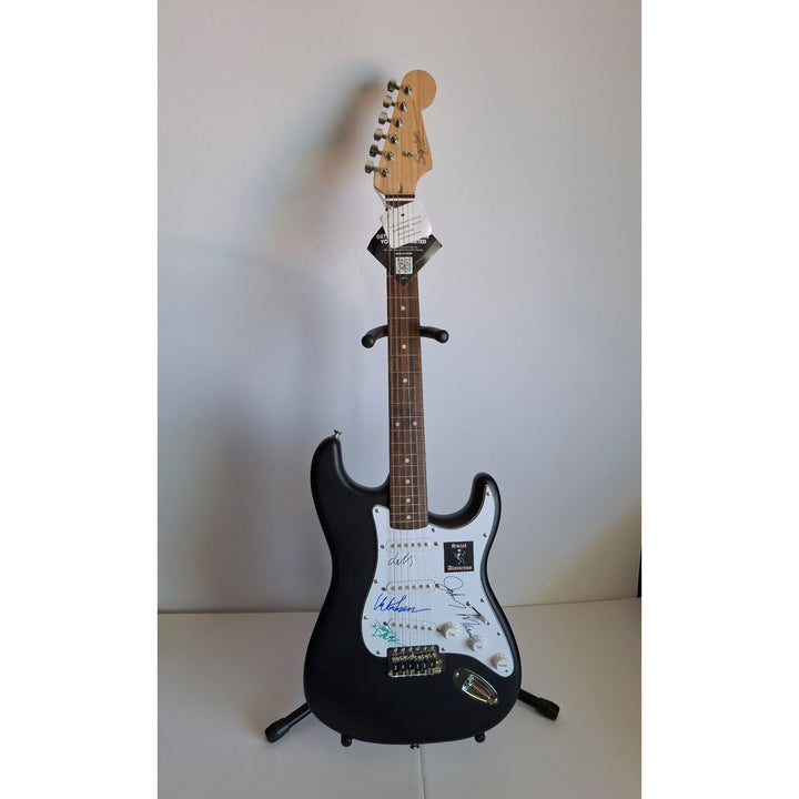 Social Distortion, Mike Ness, David Hidalgo, Jonh Maurer, Dennis Danell Fender Stratocaster Squier electric guitar signed with proof