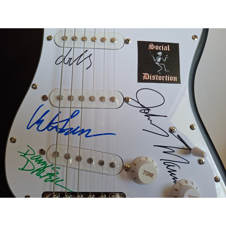 Social Distortion, Mike Ness, David Hidalgo, Jonh Maurer, Dennis Danell Fender Stratocaster Squier electric guitar signed with proof