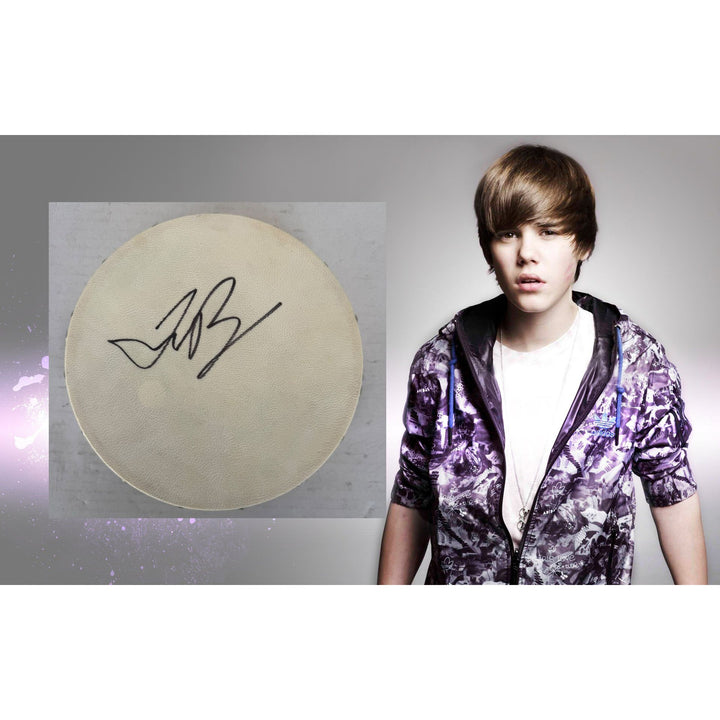 Justin Bieber Tambourine 8" signed with proof.