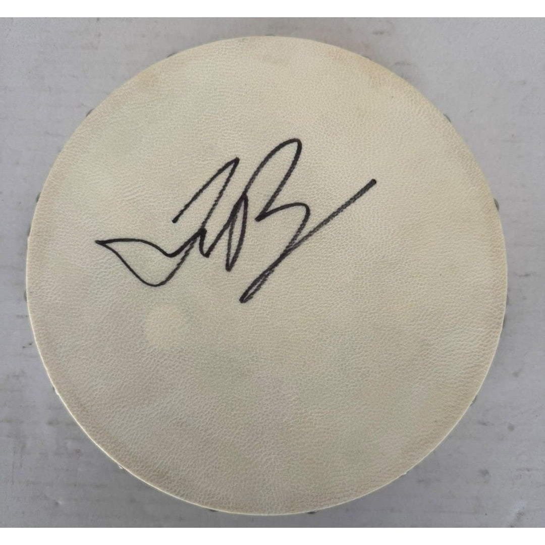 Justin Bieber Tambourine 8" signed with proof.