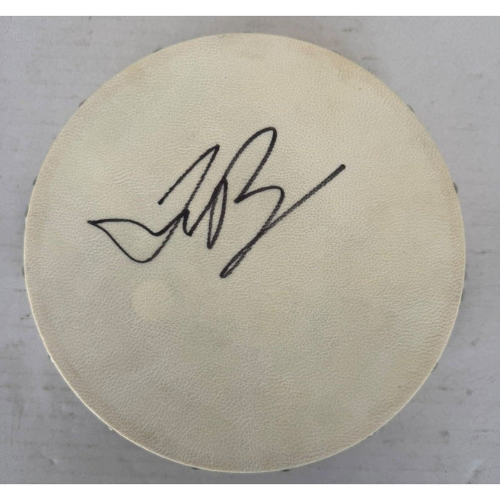 Justin Bieber Tambourine 8" signed with proof.